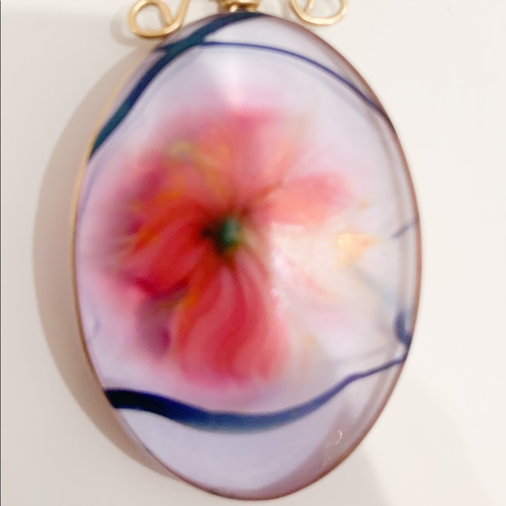 Flower resin pendant.